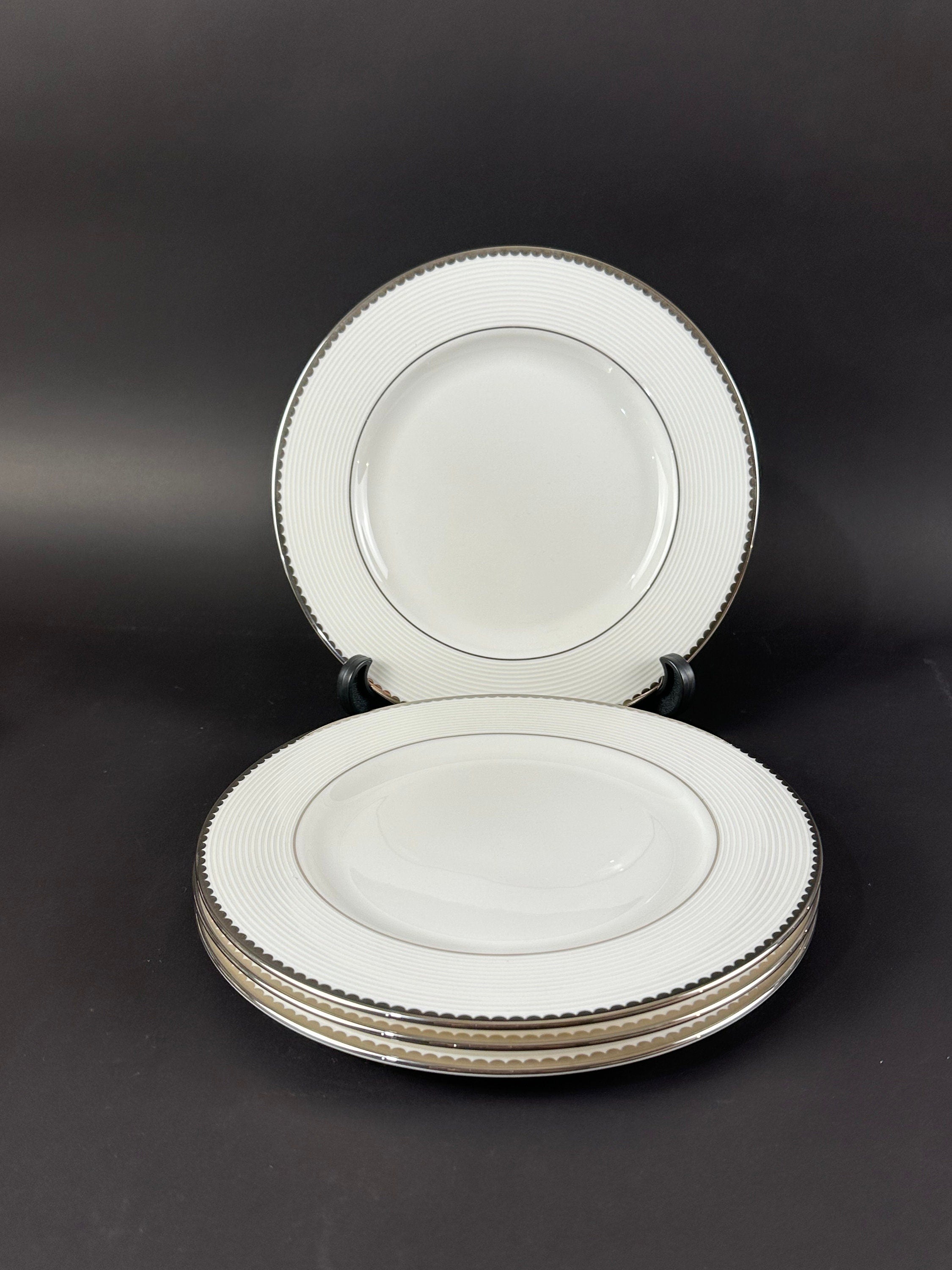 Four Lenox “Sugar Point” Pattern Salad Plates by Kate Spade.