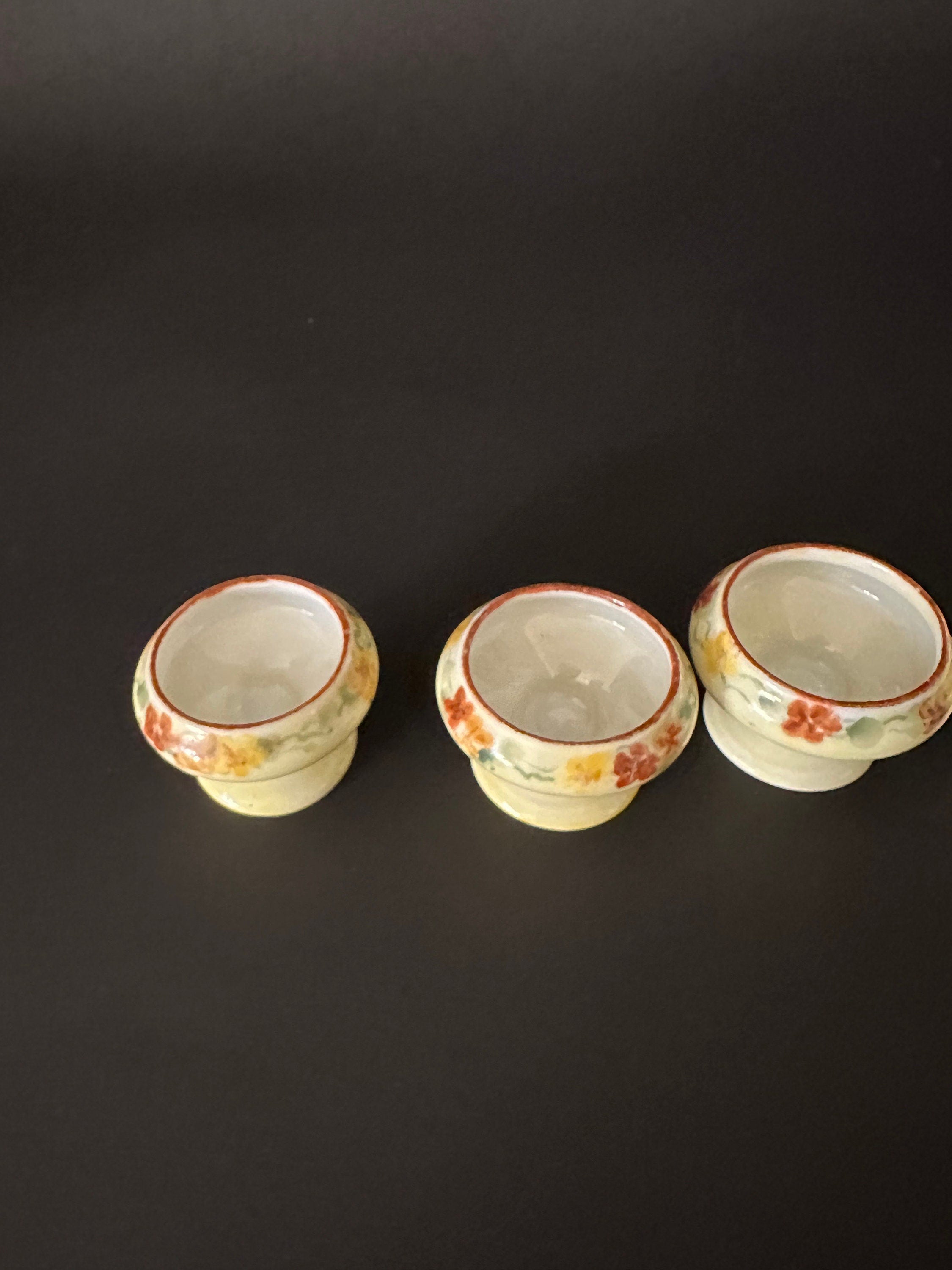 Four Antique Hand Painted Salt Cellars