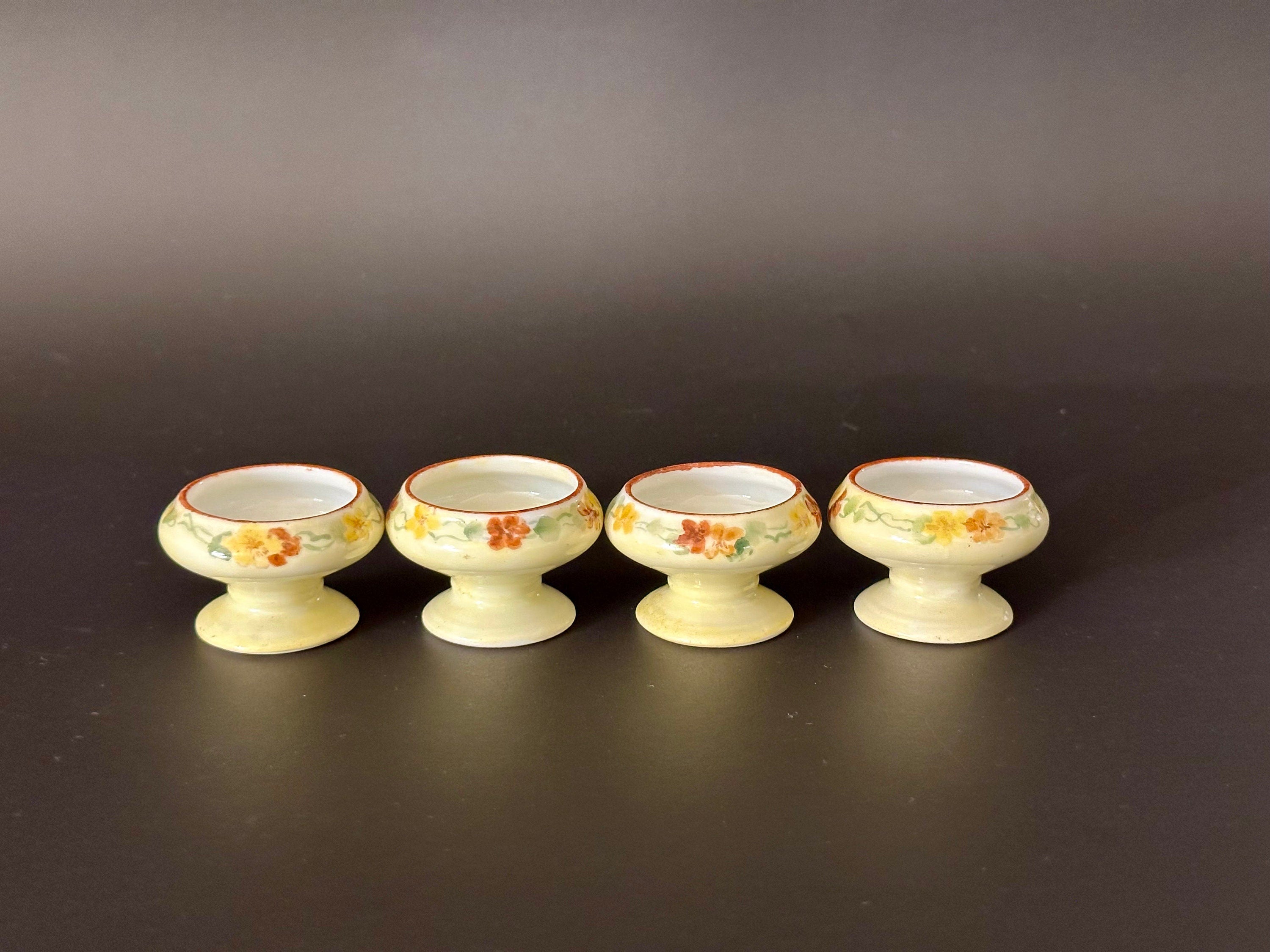 Four Antique Hand Painted Salt Cellars