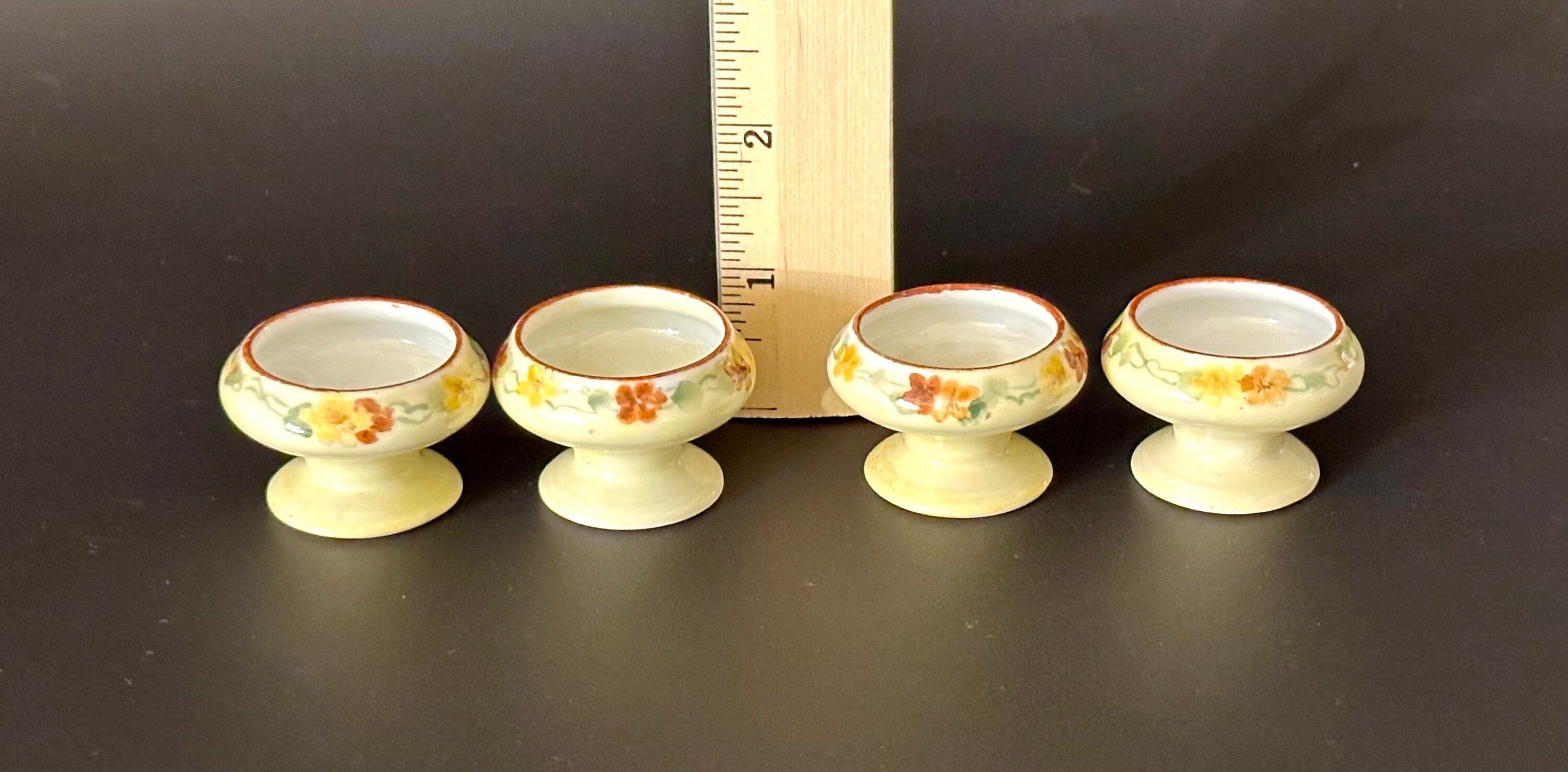 Four Antique Hand Painted Salt Cellars
