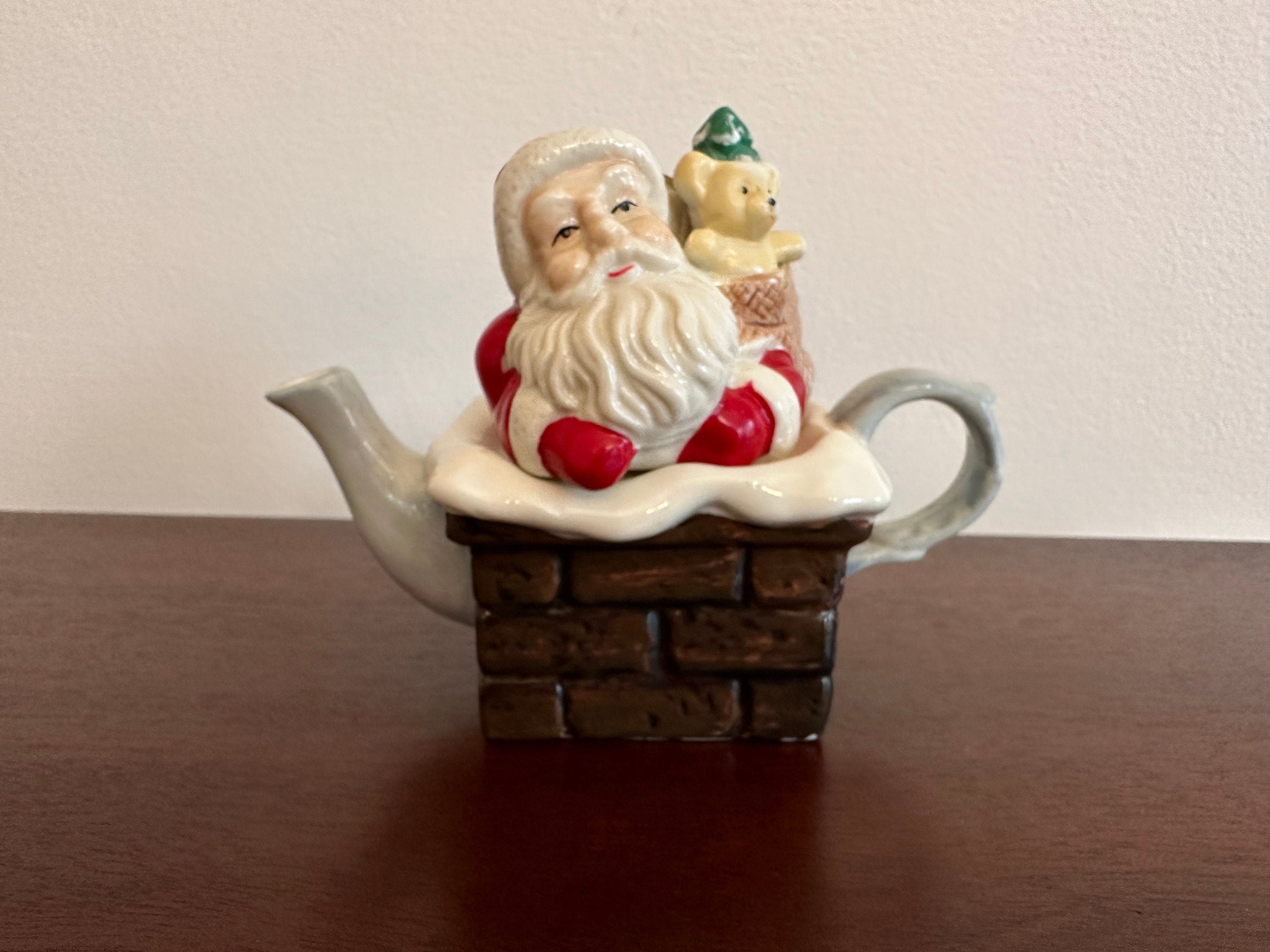 Small Santa in Chimney Teapot