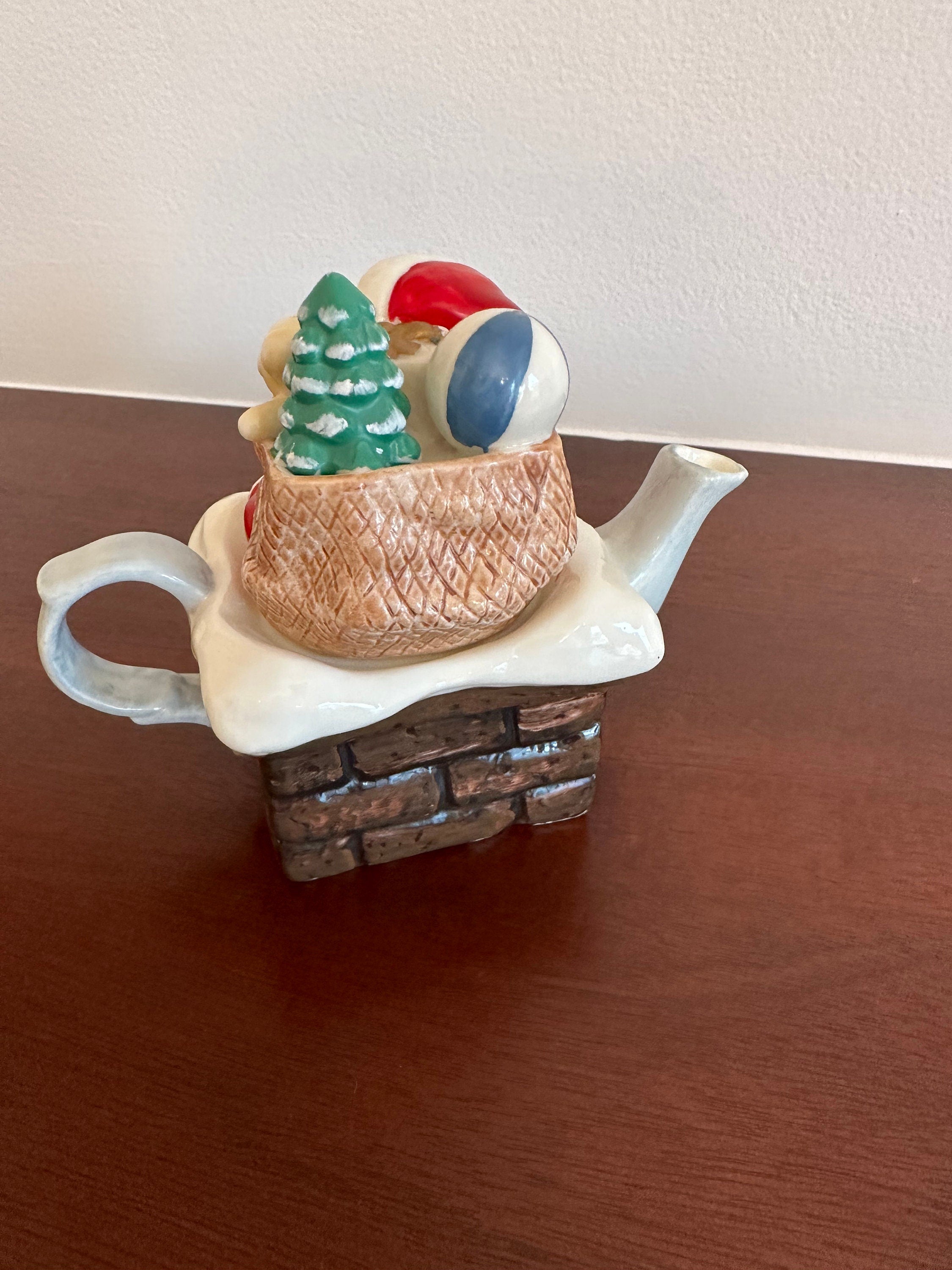Small Santa in Chimney Teapot