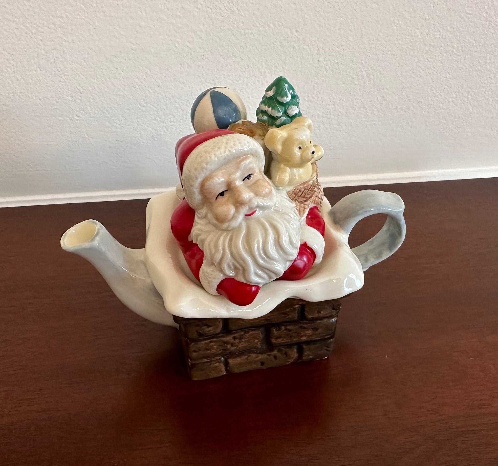 Small Santa in Chimney Teapot