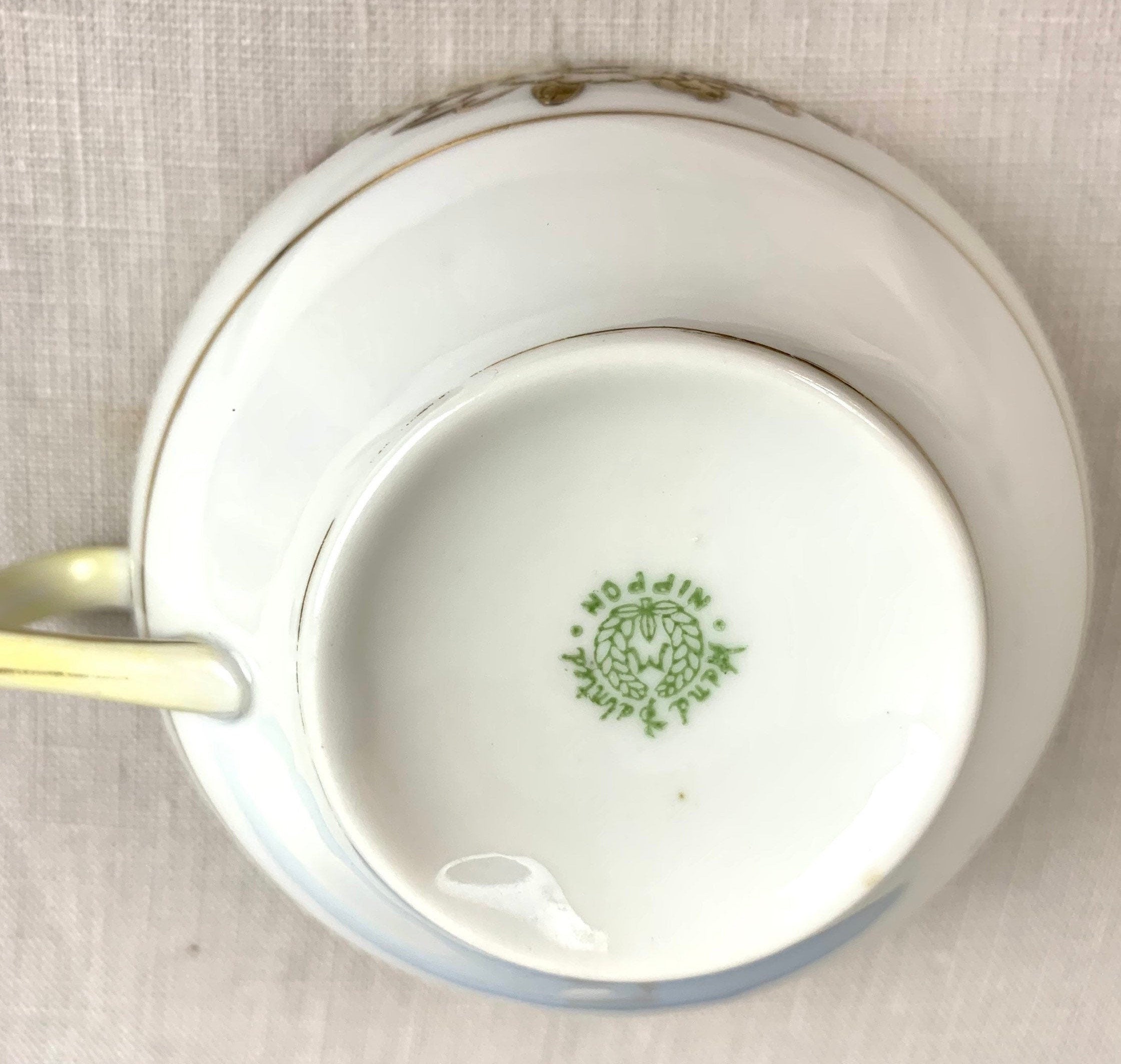 A Pair of Antique Noritake Teacups and Saucers