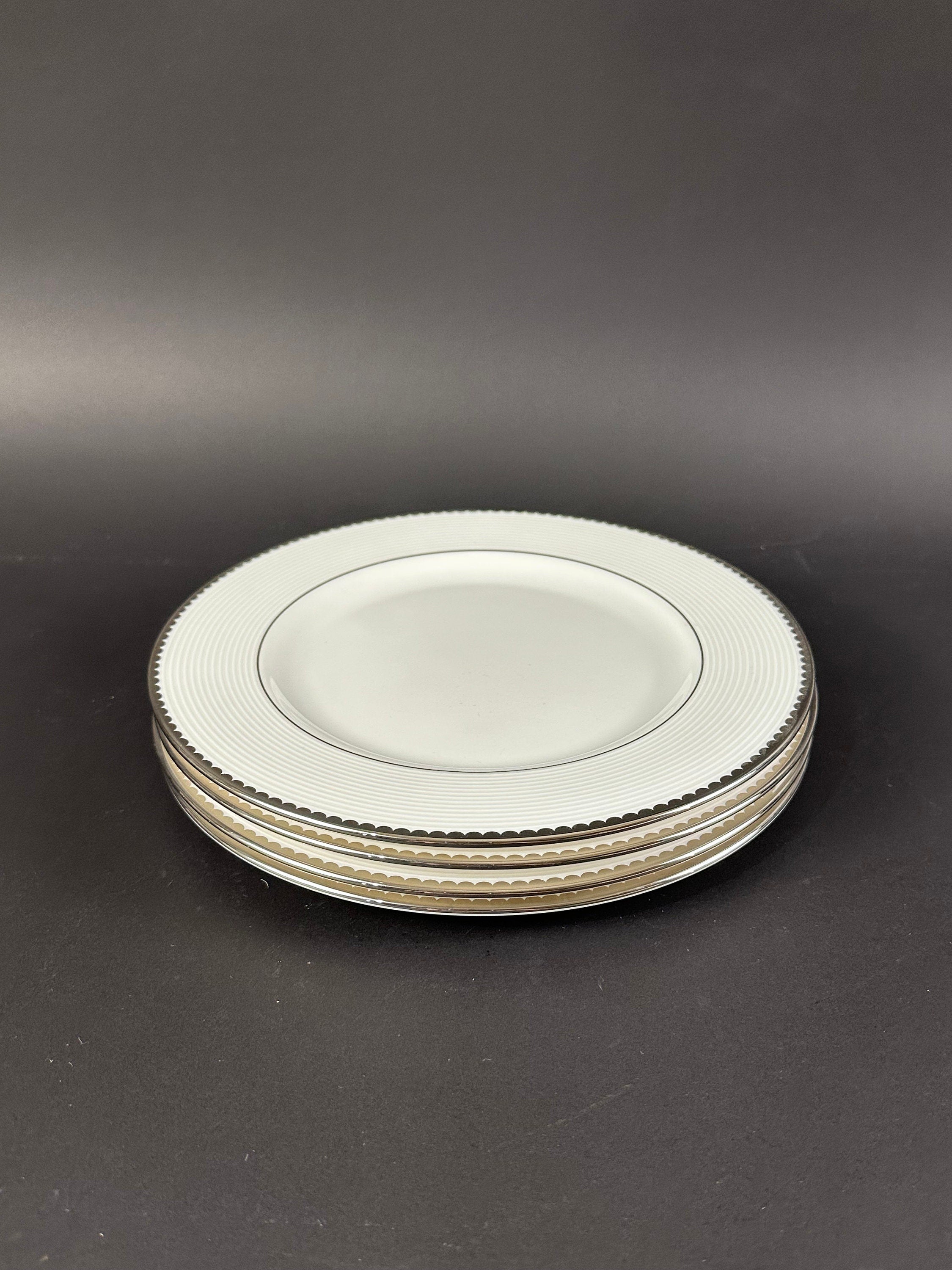 Four Lenox “Sugar Point” Pattern Salad Plates by Kate Spade.