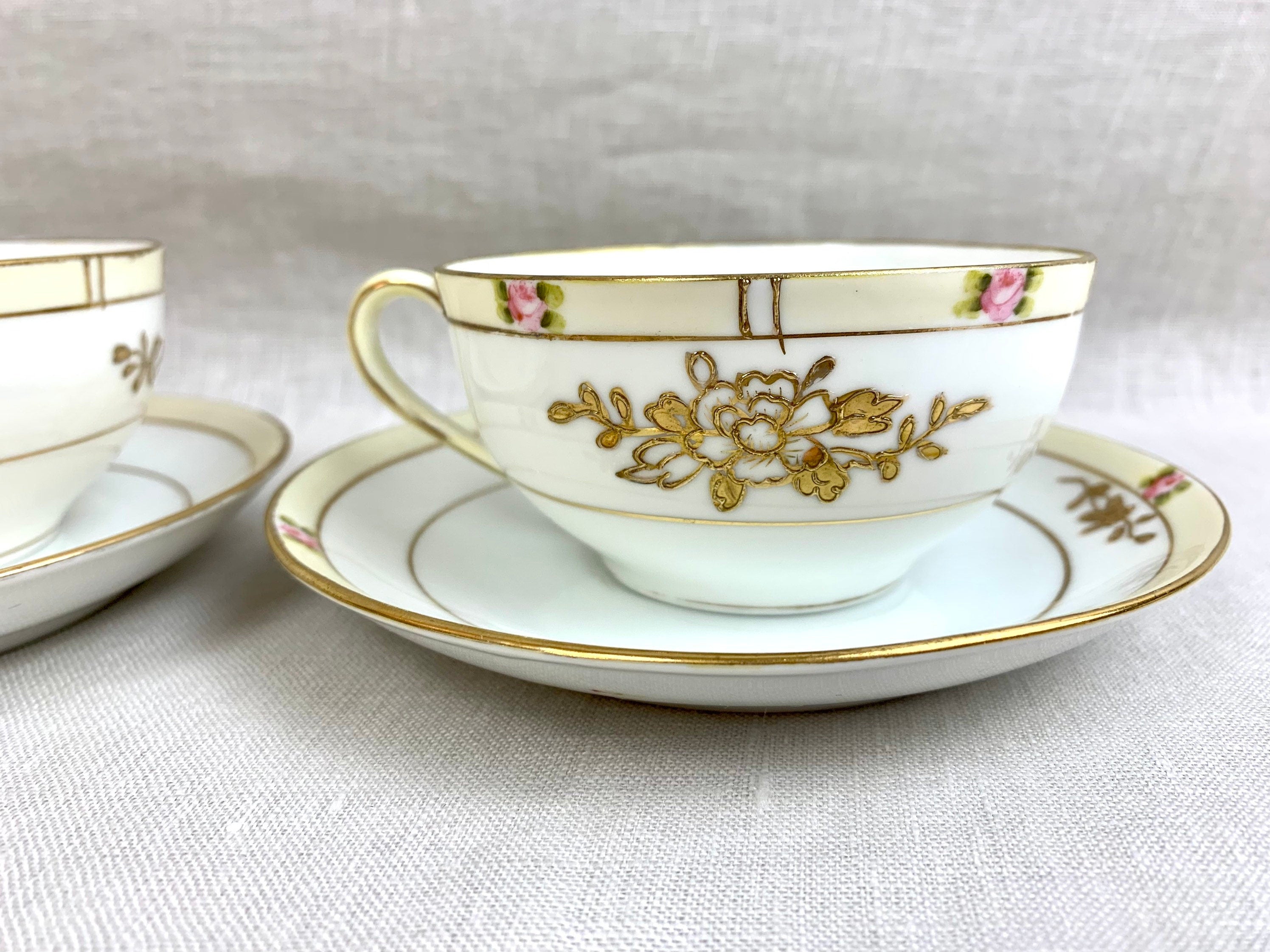 A Pair of Antique Noritake Teacups and Saucers