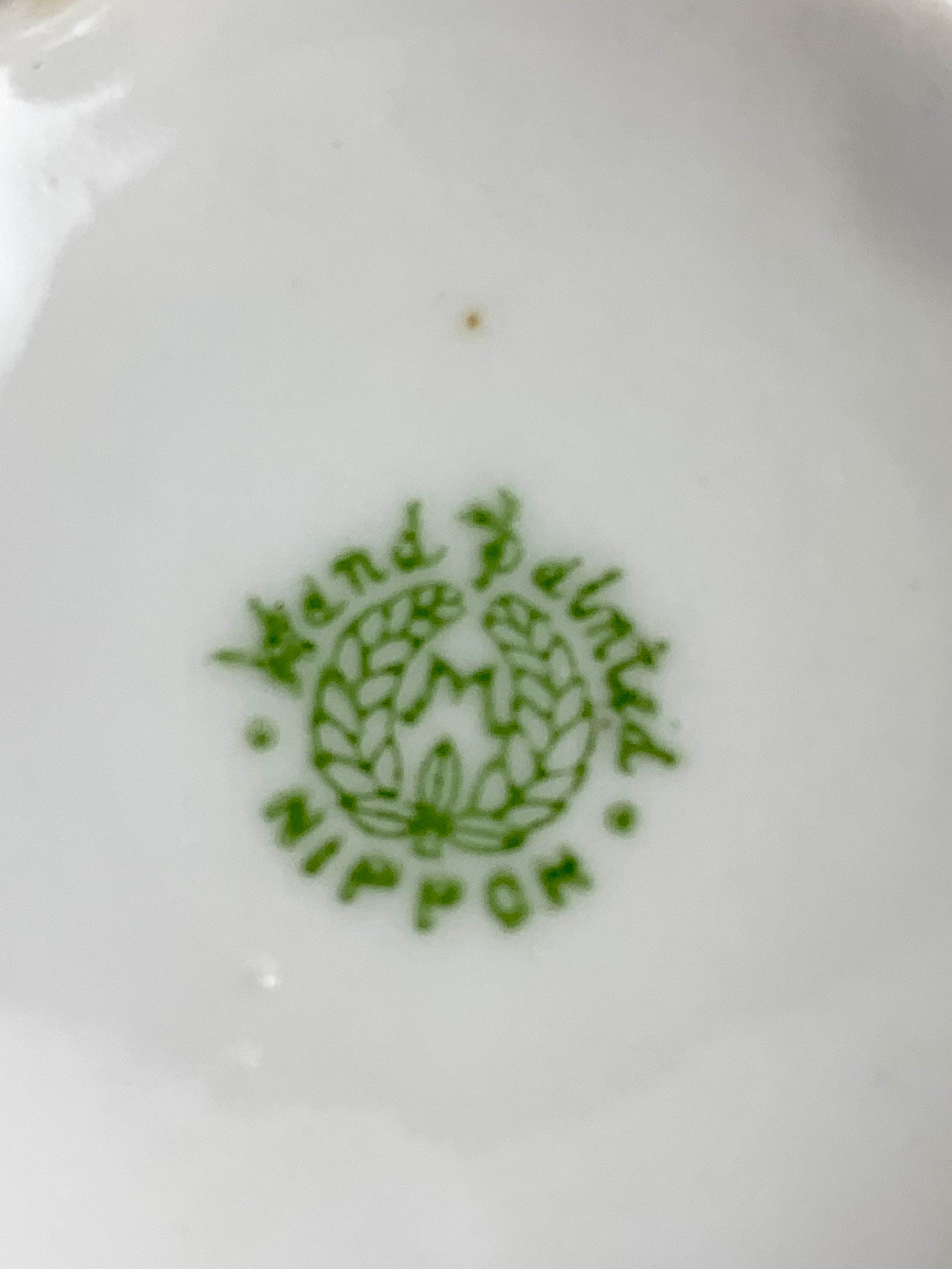 A Pair of Antique Noritake Teacups and Saucers