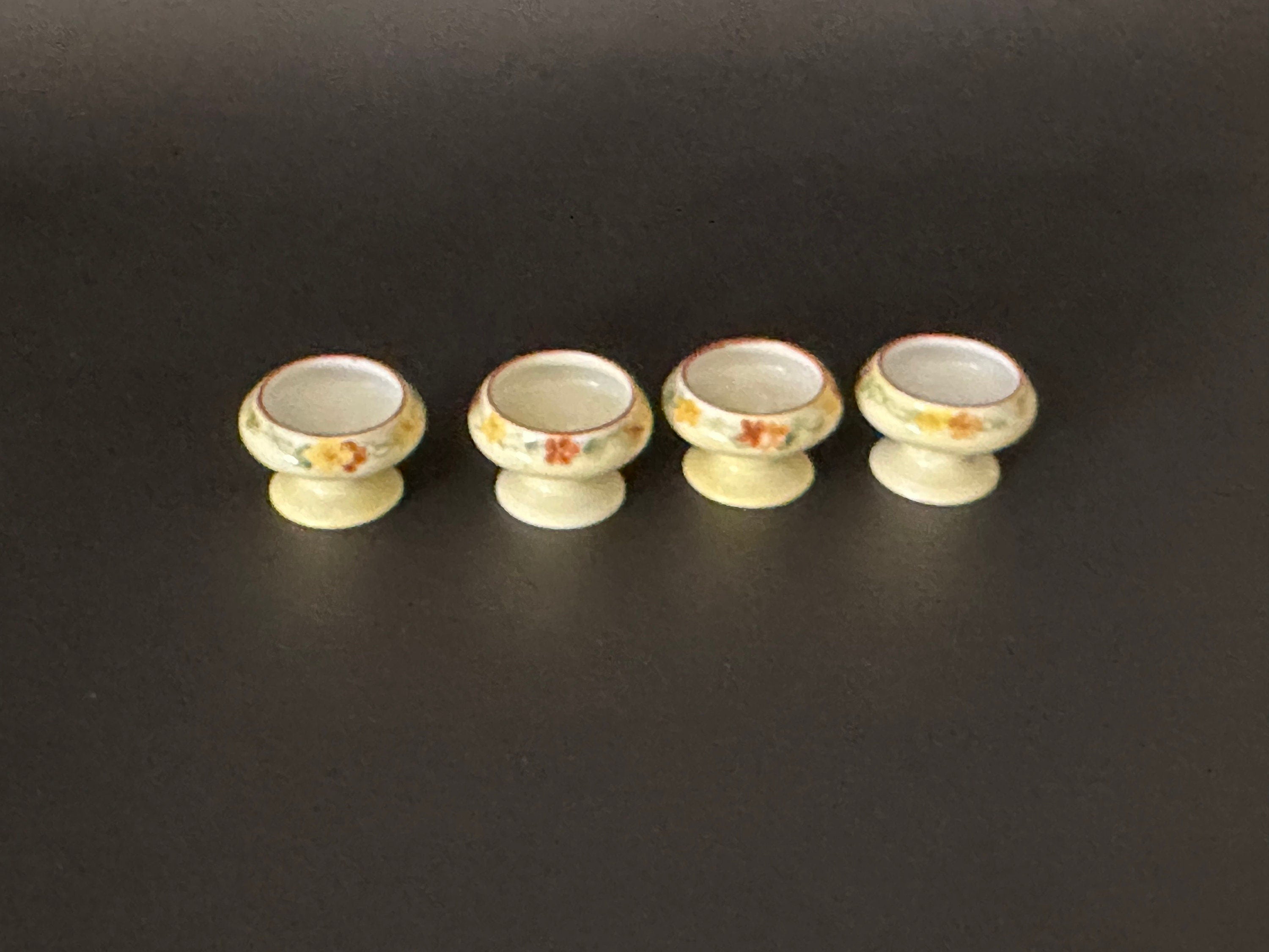 Four Antique Hand Painted Salt Cellars