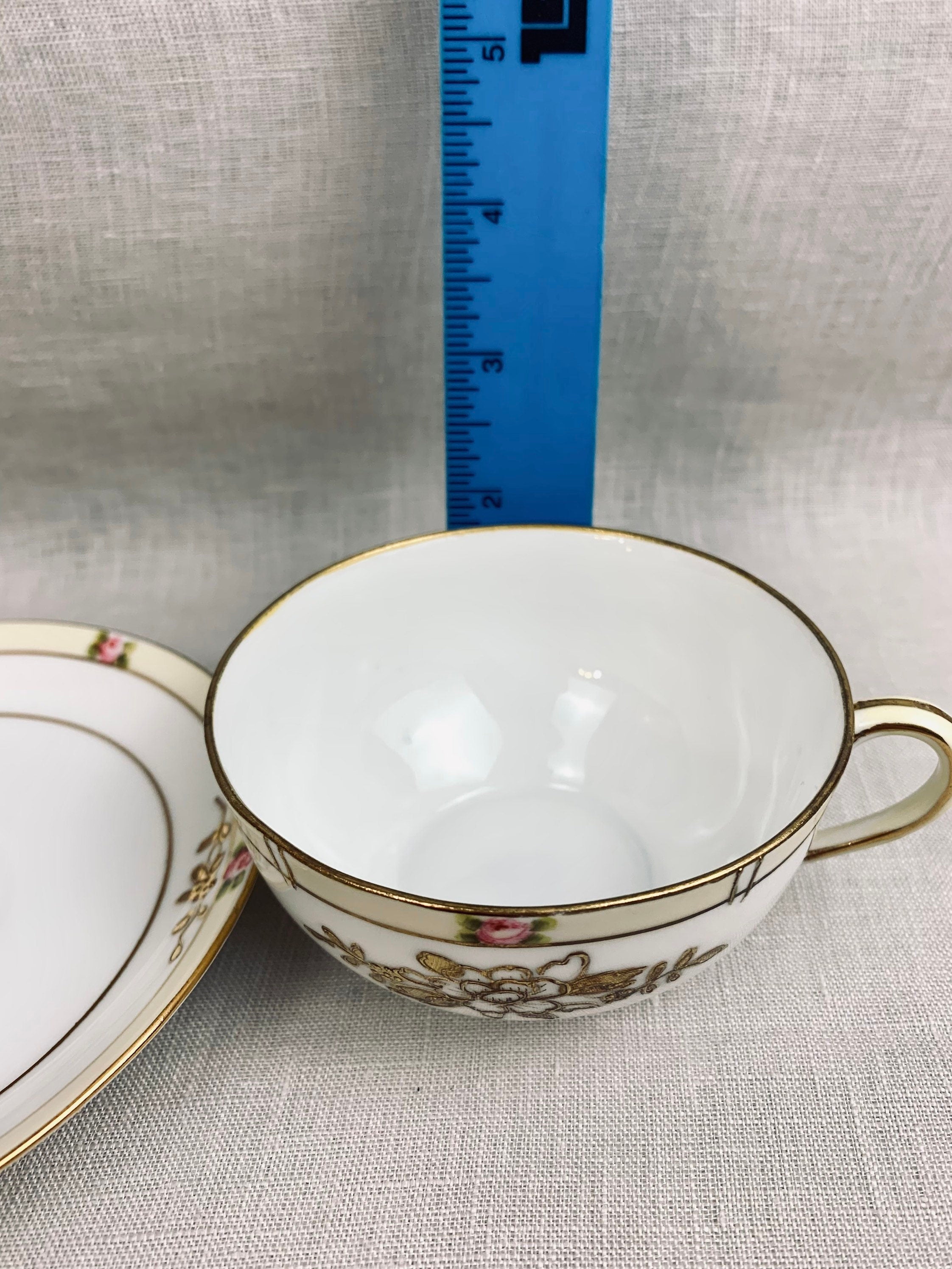 A Pair of Antique Noritake Teacups and Saucers