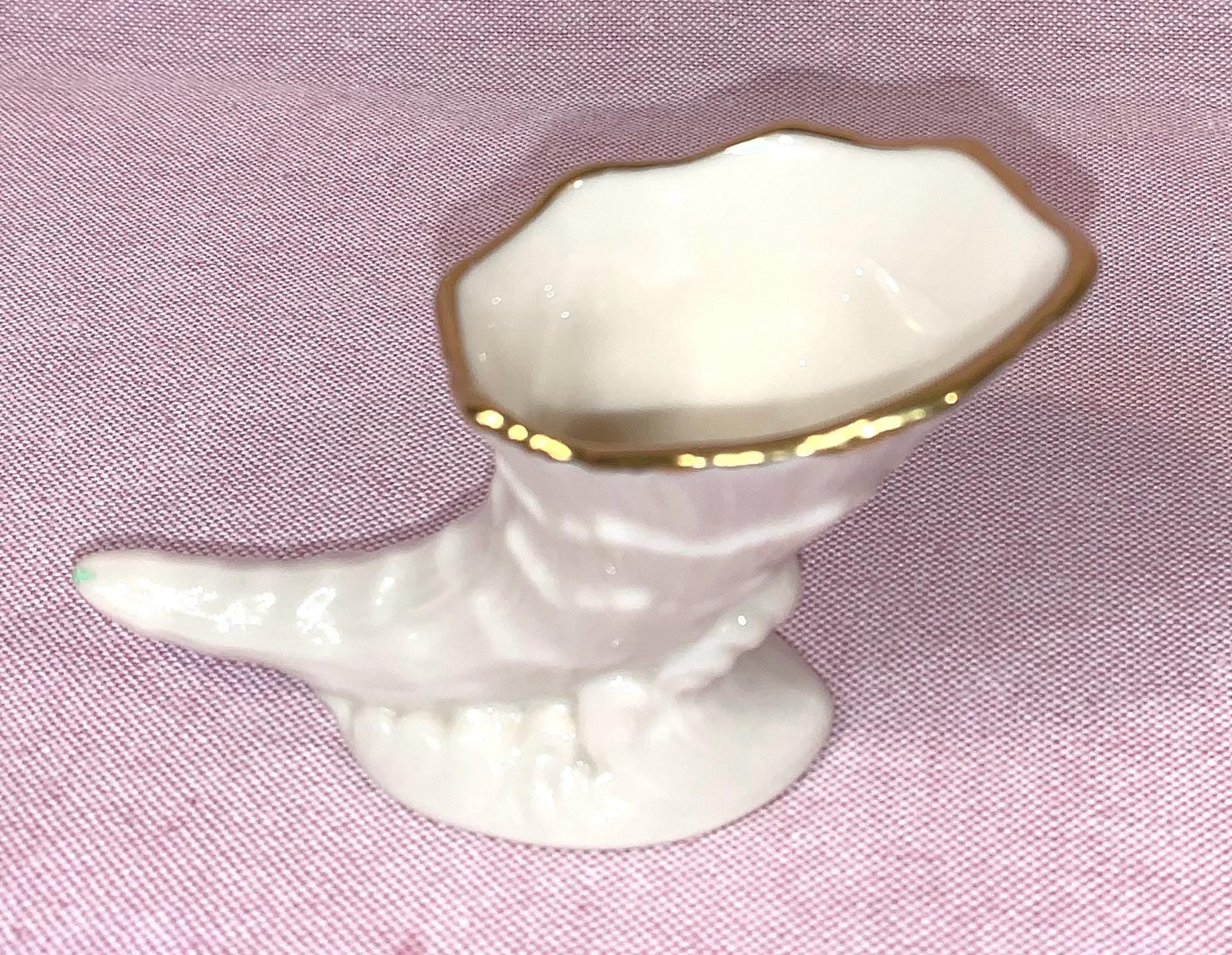 Cornecopia Shaped Shell on Waves Vase