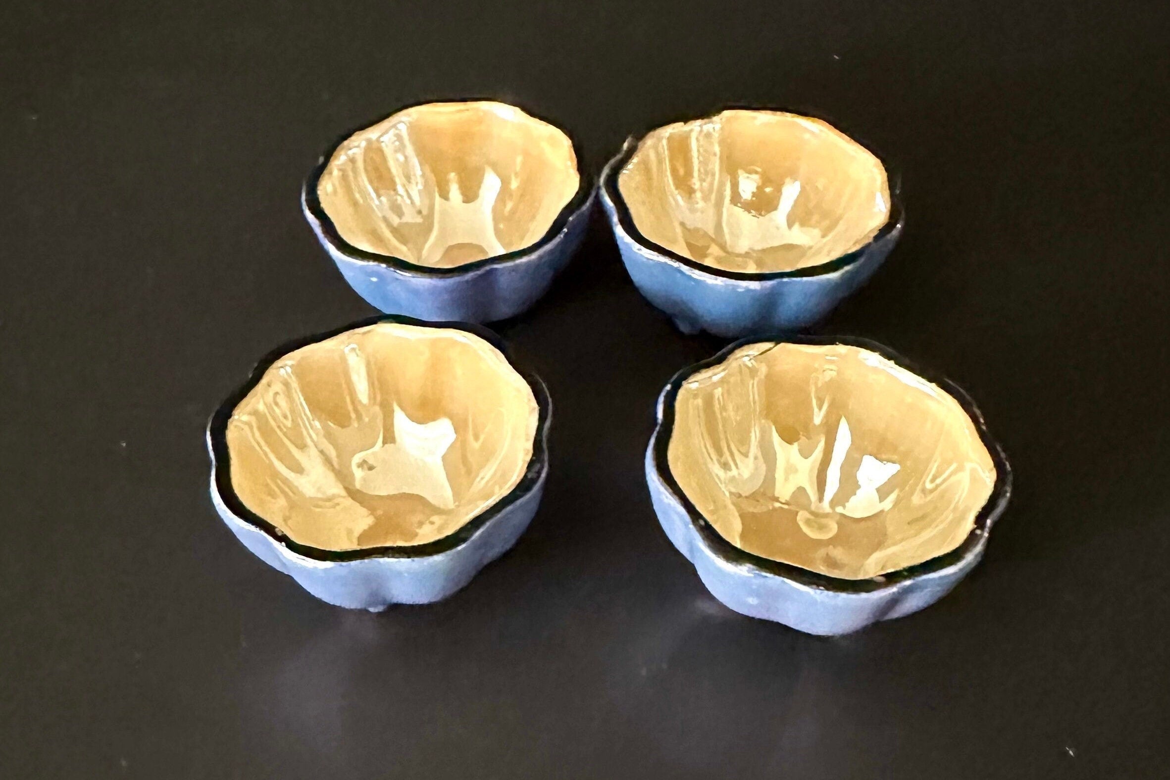 Four Irridescent Lusterware Salt Cellars