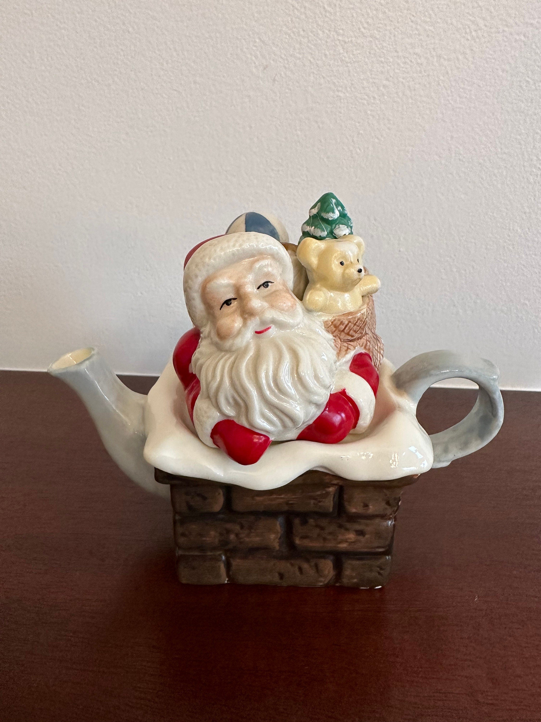 Small Santa in Chimney Teapot
