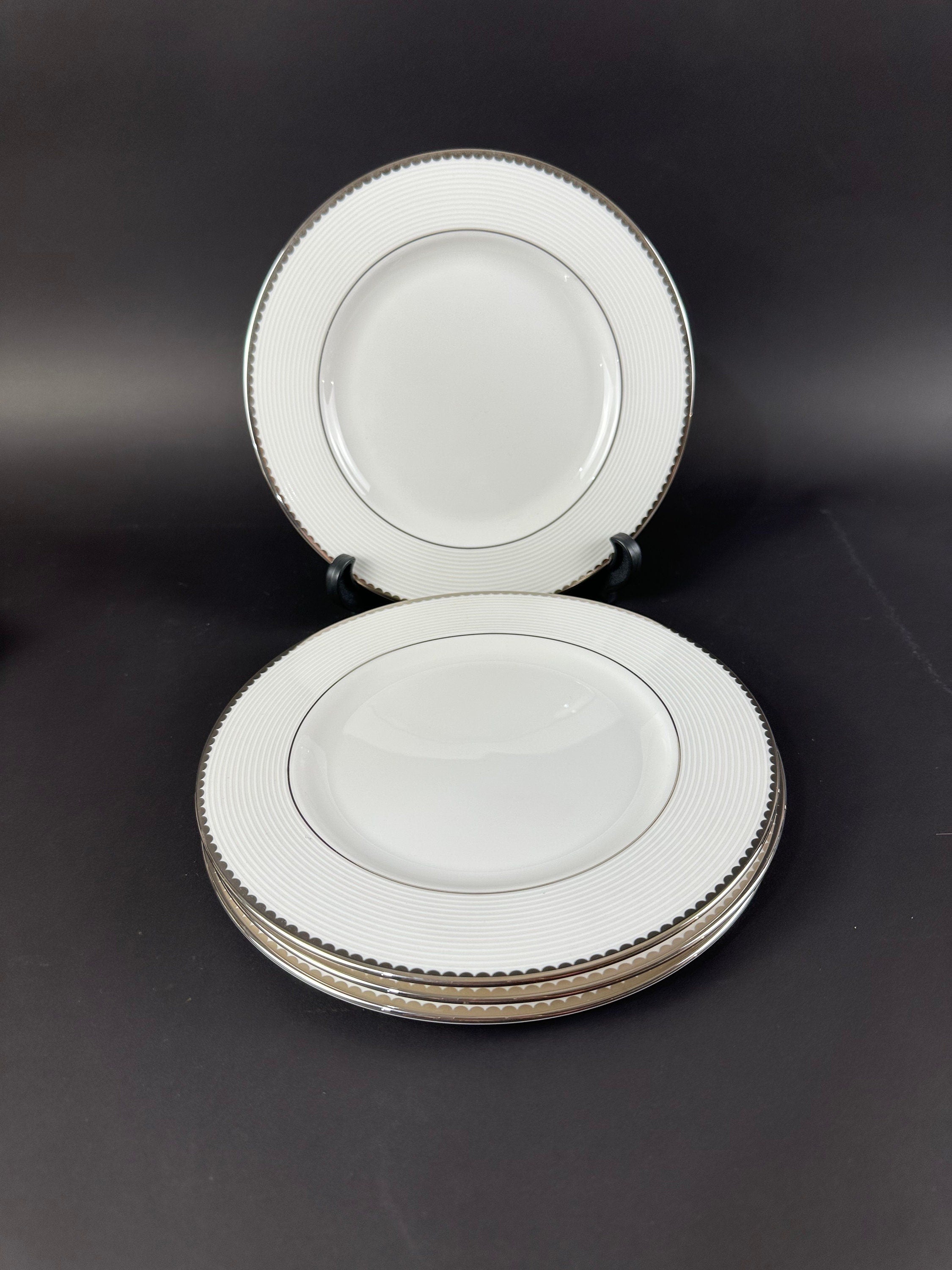 Four Lenox “Sugar Point” Pattern Salad Plates by Kate Spade.