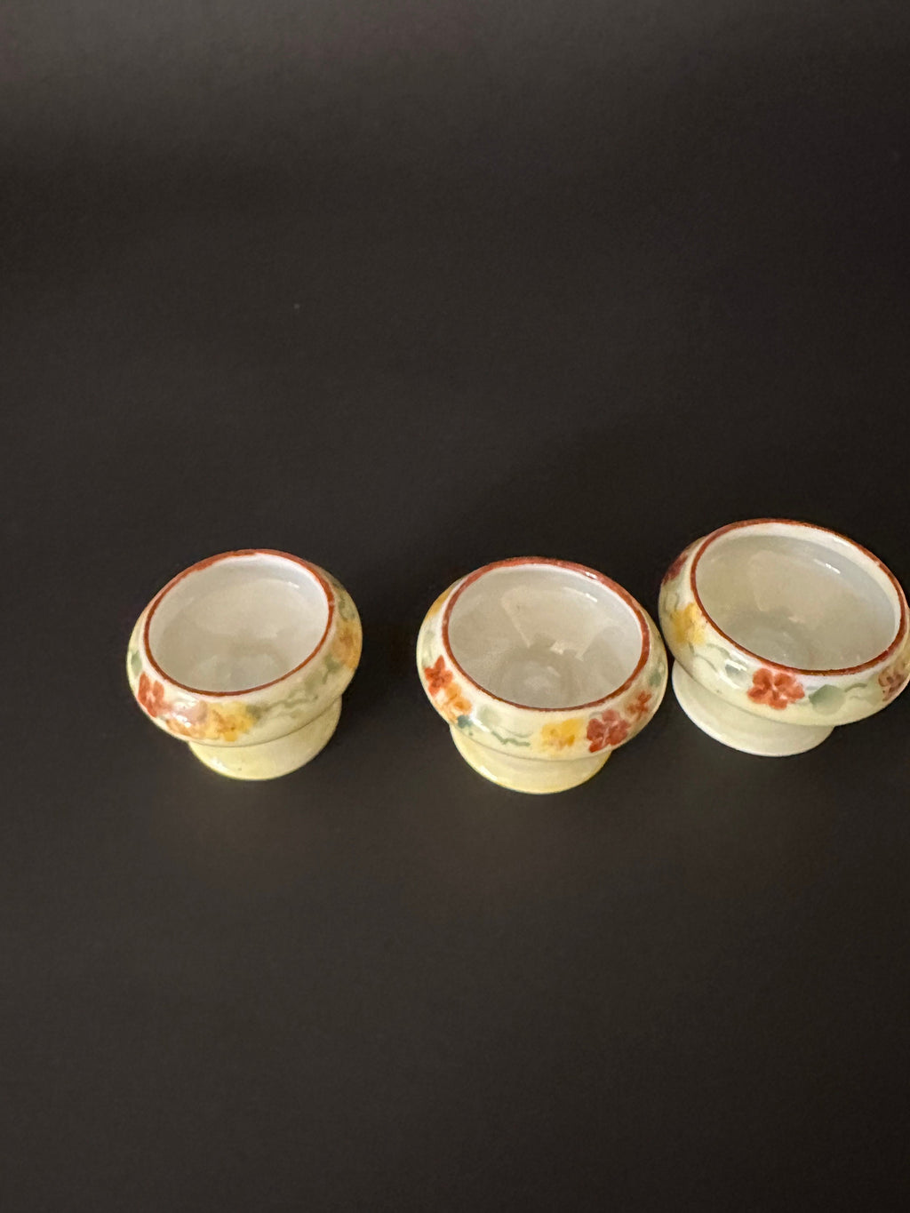 Four Antique Hand Painted Salt Cellars