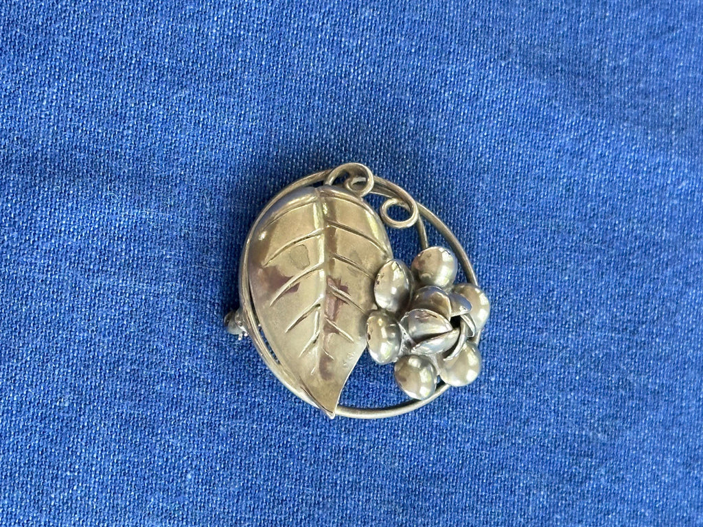 Vintage Sterling Silver Circle Brooch With Flower and Leaf