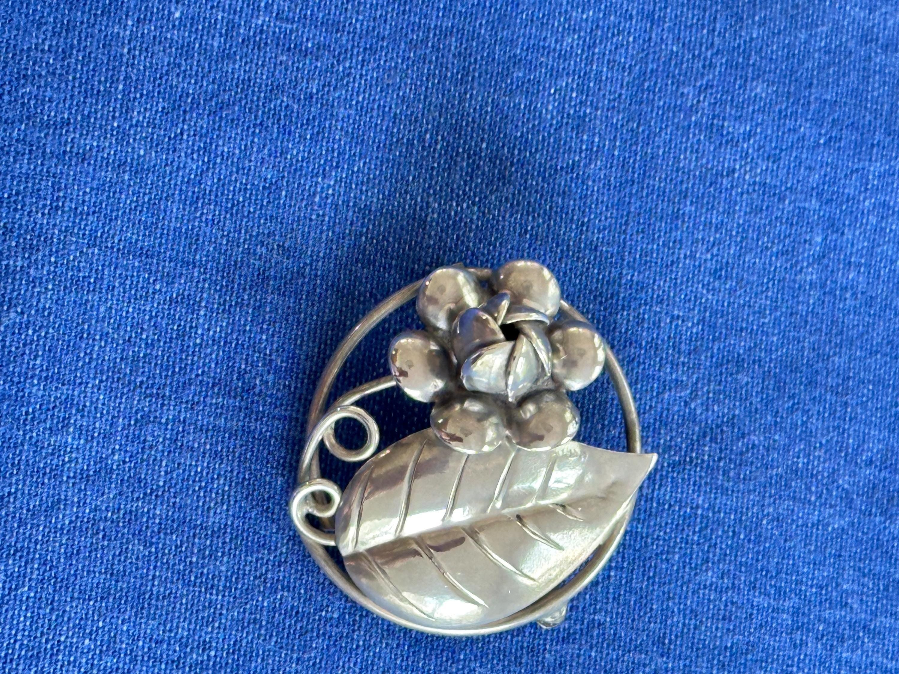 Vintage Sterling Silver Circle Brooch With Flower and Leaf
