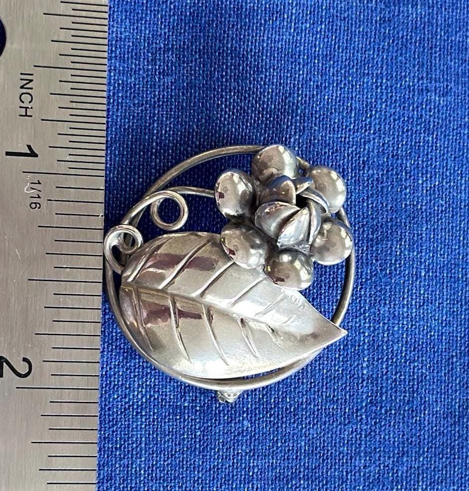 Vintage Sterling Silver Circle Brooch With Flower and Leaf