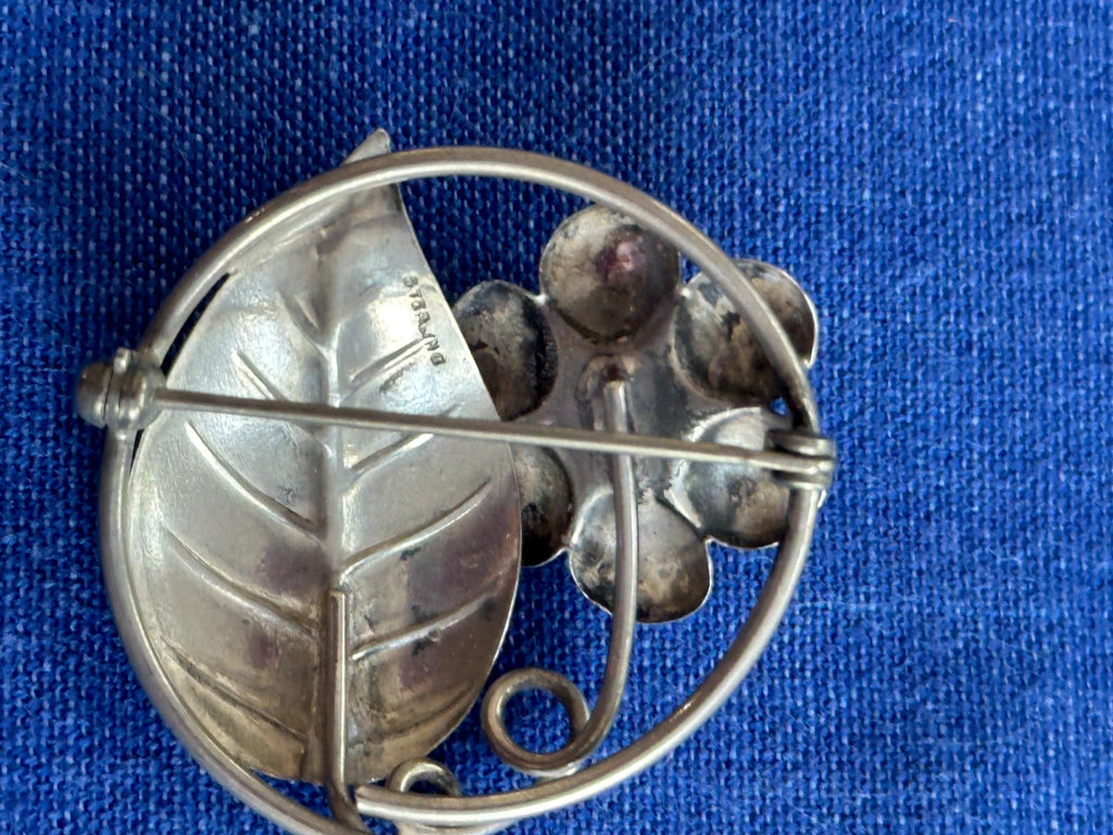 Vintage Sterling Silver Circle Brooch With Flower and Leaf
