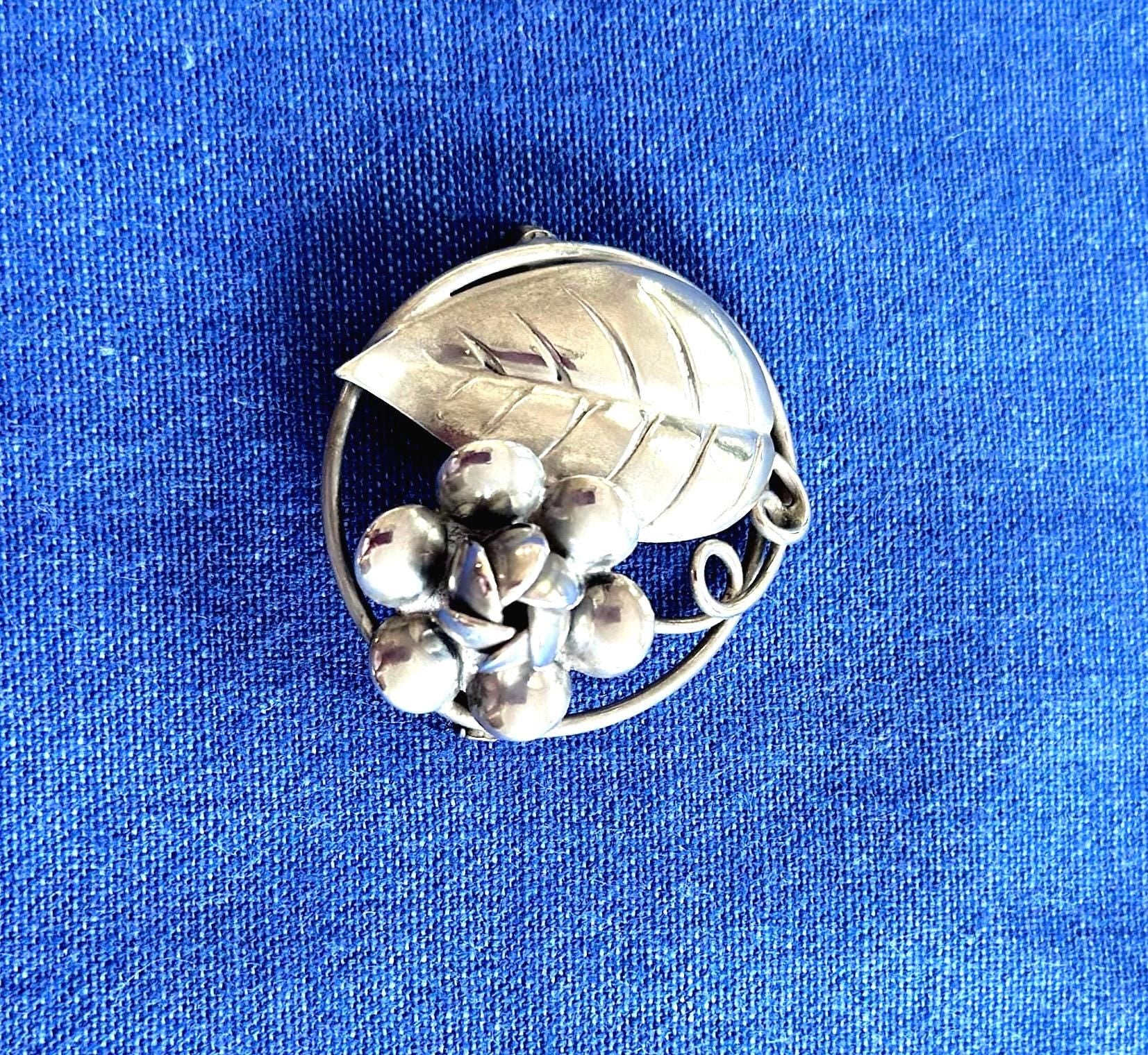 Vintage Sterling Silver Circle Brooch With Flower and Leaf
