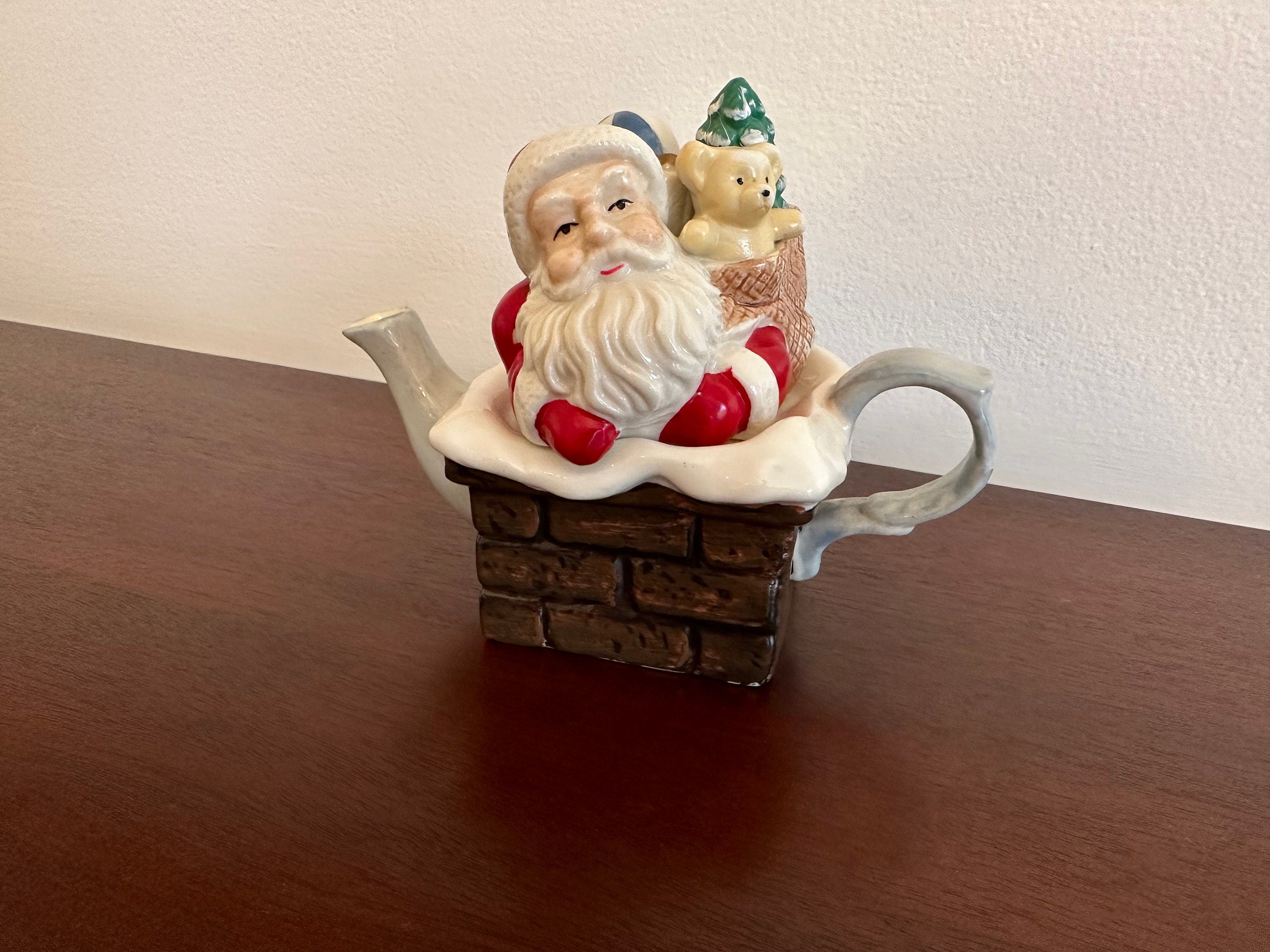 Small Santa in Chimney Teapot