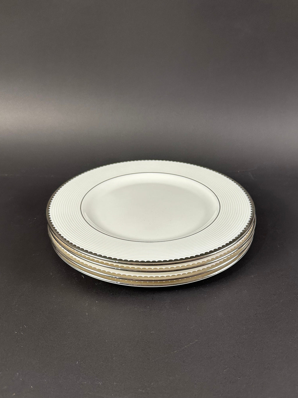 Four Lenox “Sugar Point” Pattern Salad Plates by Kate Spade.