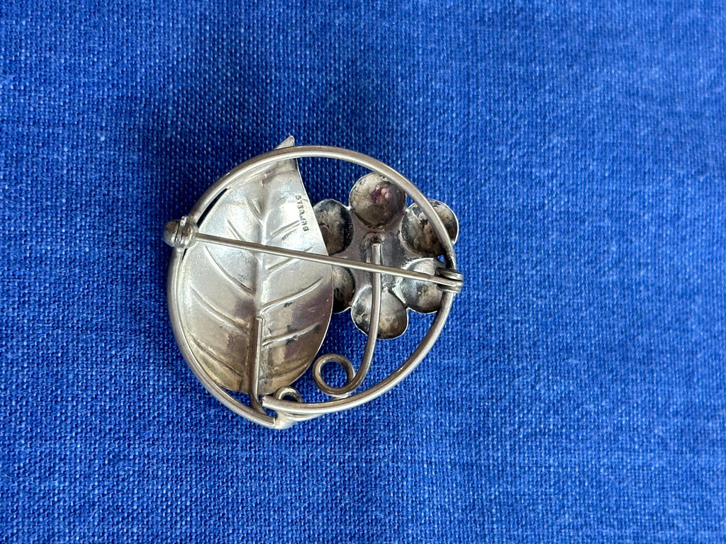 Vintage Sterling Silver Circle Brooch With Flower and Leaf