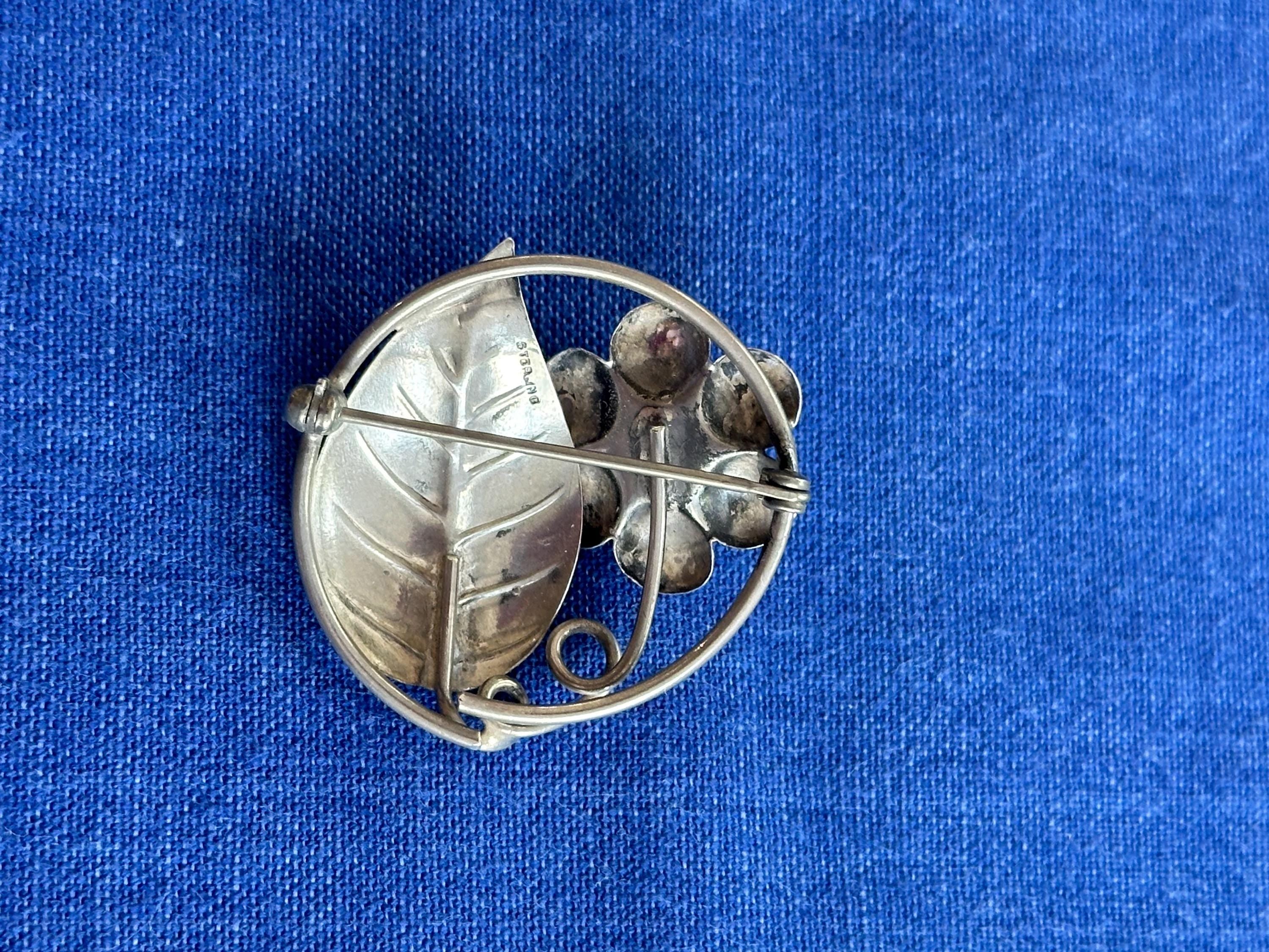 Vintage Sterling Silver Circle Brooch With Flower and Leaf