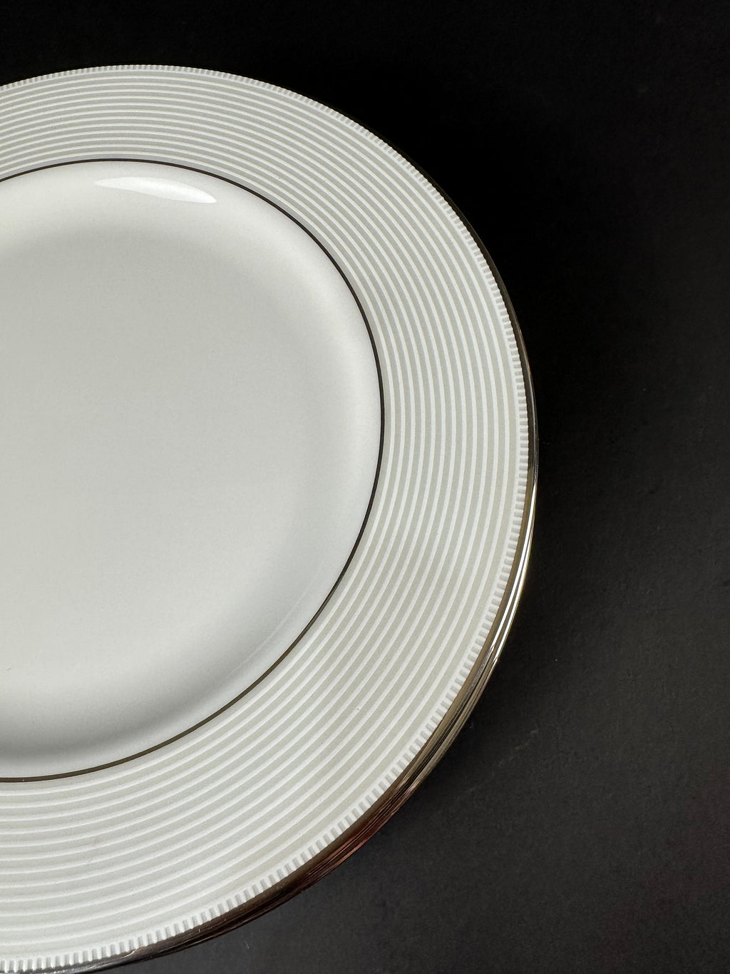 Four Lenox “Opal Innocence Stripe” Salad Plates by Kate Spade.