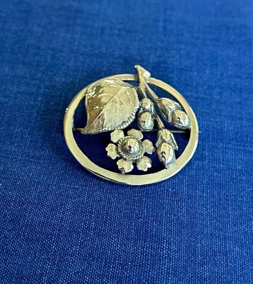 Vintage Sterling Silver Circle Brooch with Flowers