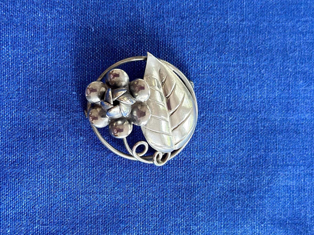 Vintage Sterling Silver Circle Brooch With Flower and Leaf