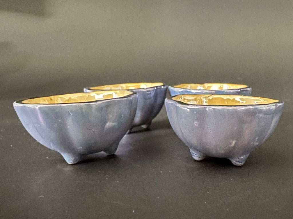 Four Irridescent Lusterware Salt Cellars