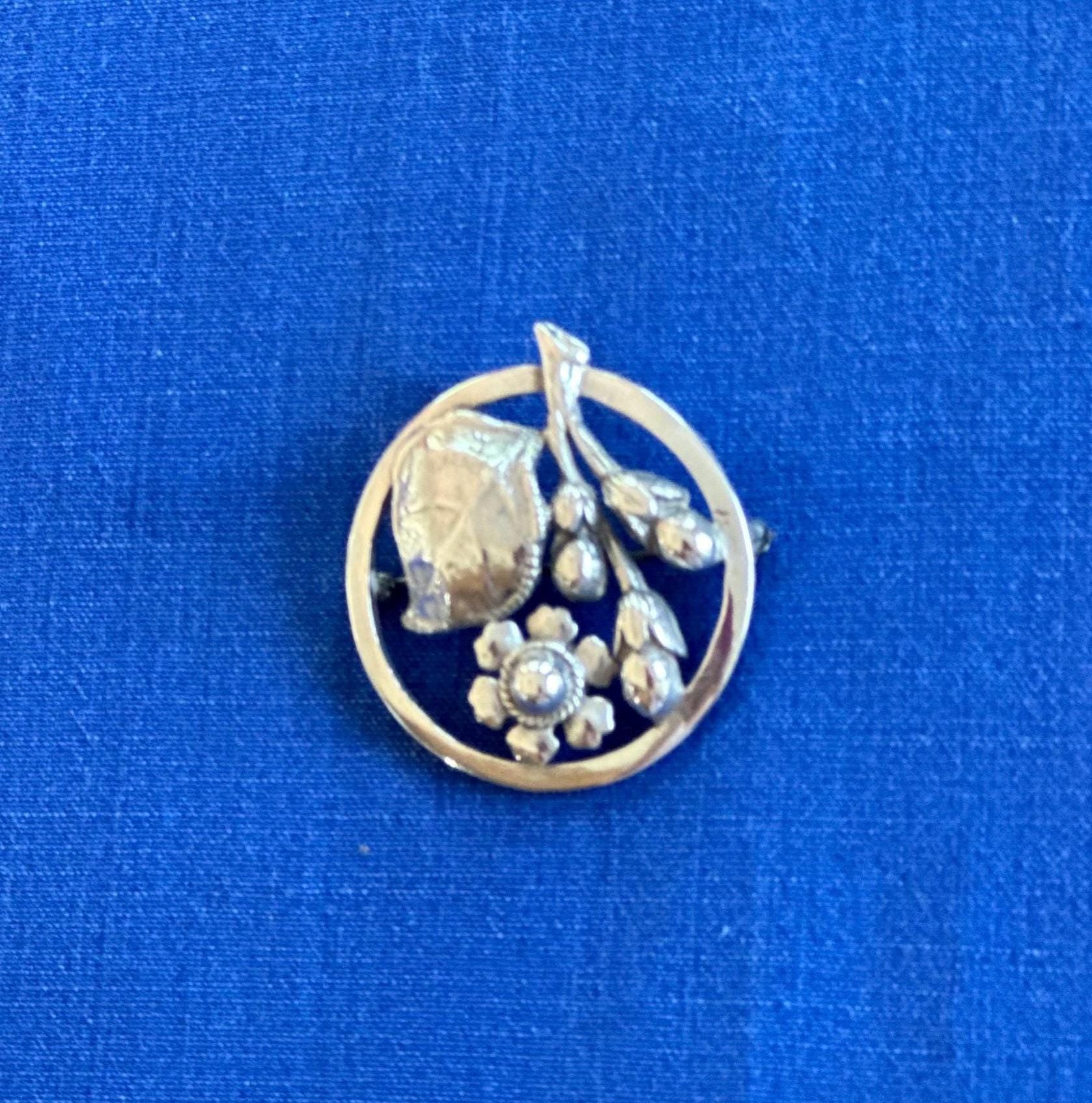 Vintage Sterling Silver Circle Brooch with Flowers